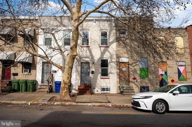 a car parked in front of a building