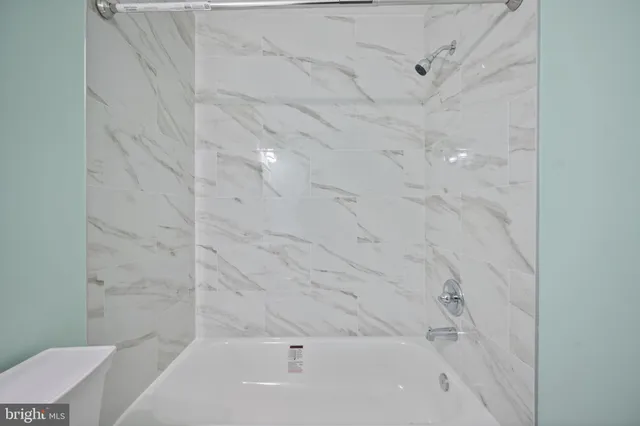 a bathroom with a bathtub