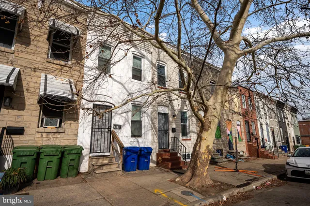 a view of a chairs and tables in the patio
