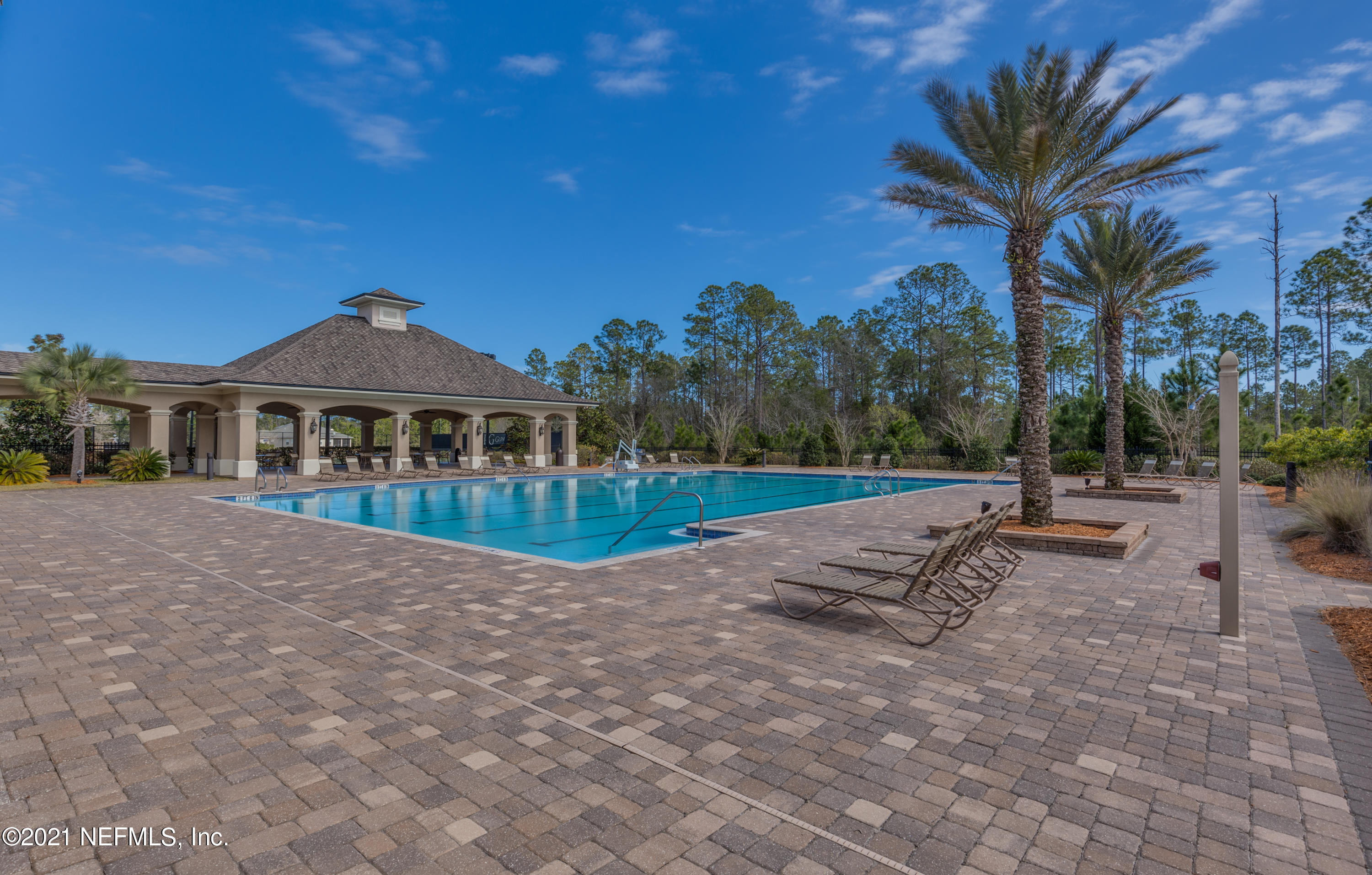 75330 Bridgewater Drive Yulee, FL 32097 - Photo 11 of 13 a view of a house with a yard