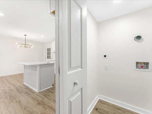 a view of a hallway with closet
