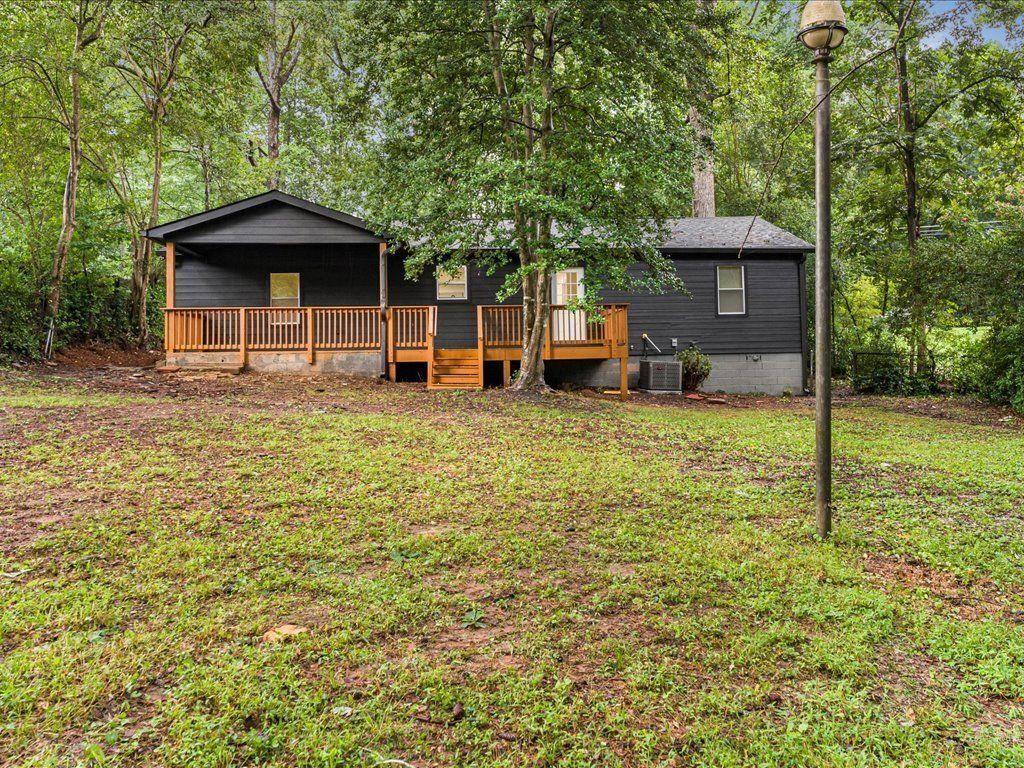5794 Pinecrest Road Austell, GA 30168 - Photo 24 of 29 a front view of a house with garden