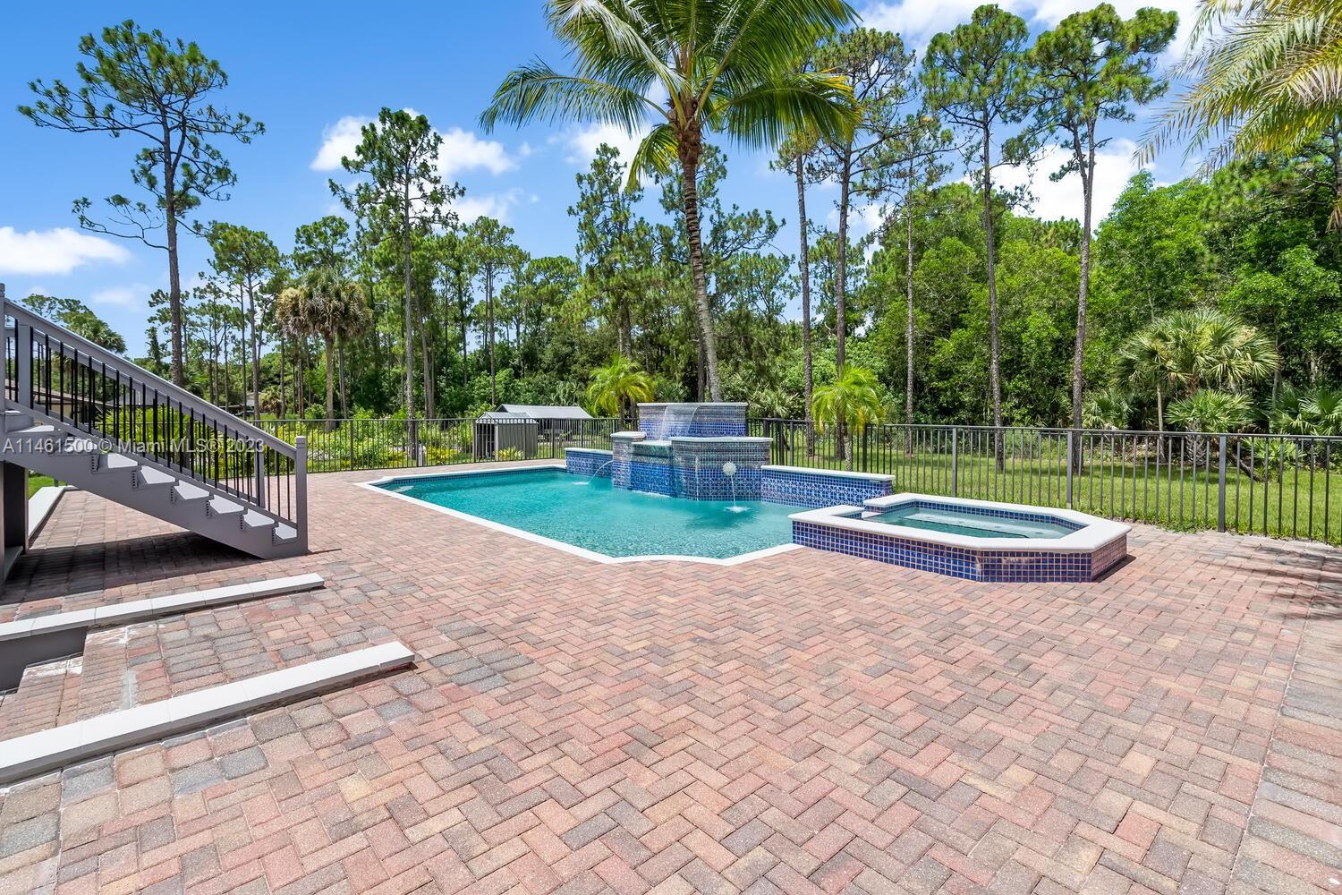 16189 Alexander Run Jupiter, FL 33478 - Photo 13 of 78 a view of a park with large trees