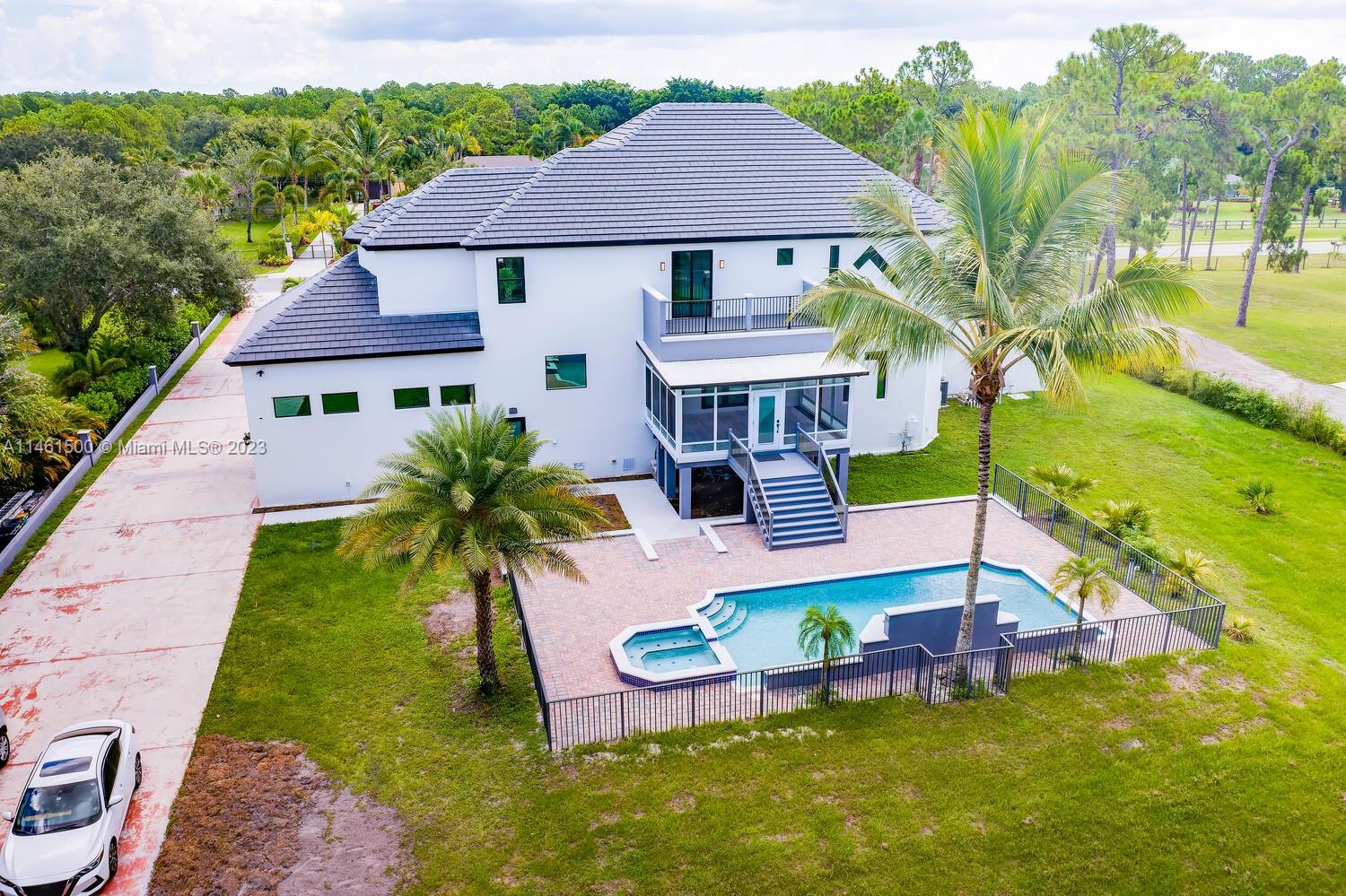 16189 Alexander Run Jupiter, FL 33478 - Photo 16 of 78 a aerial view of a house