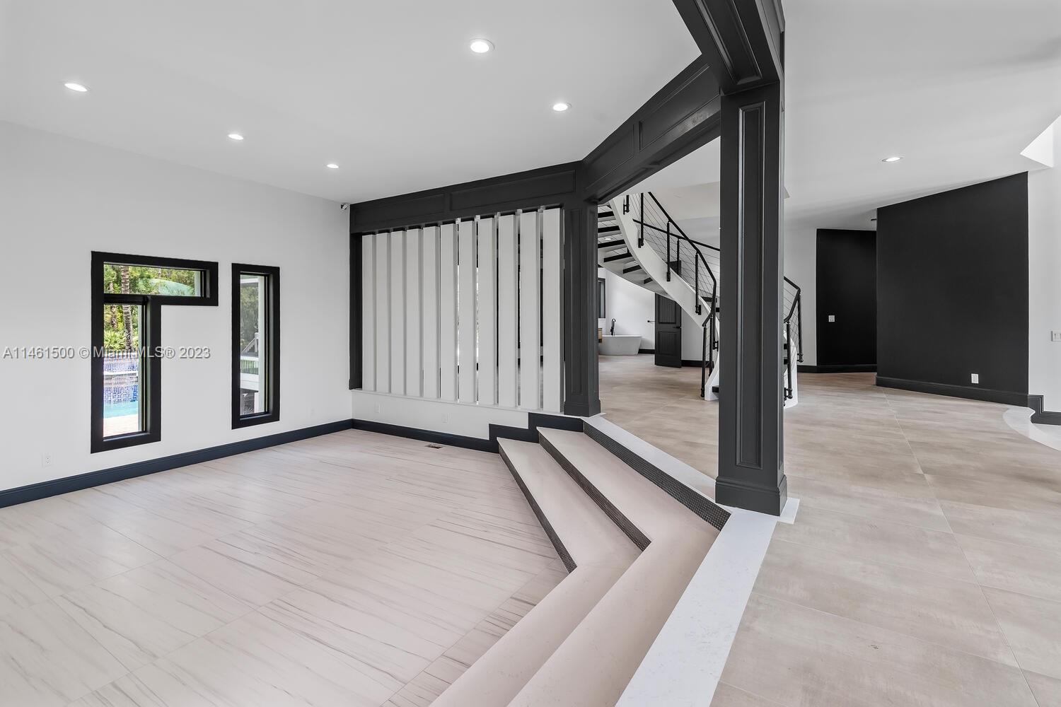16189 Alexander Run Jupiter, FL 33478 - Photo 45 of 78 a view of a hallway with staircase