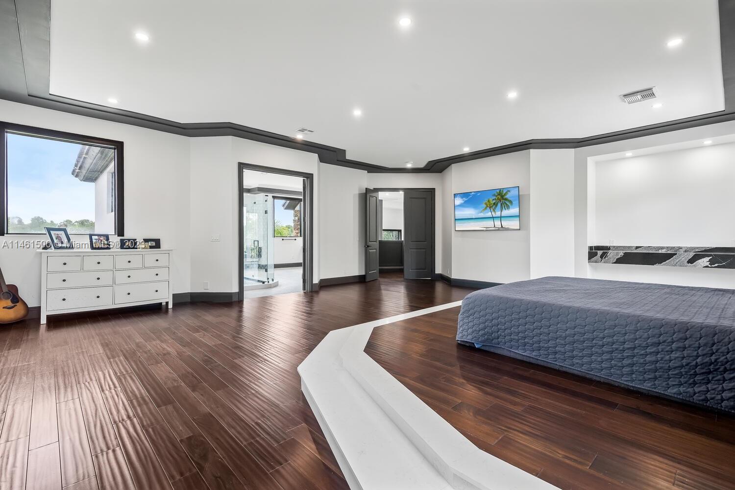 16189 Alexander Run Jupiter, FL 33478 - Photo 61 of 78 a living room with furniture and a wooden floor