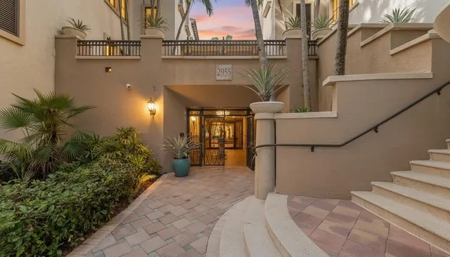 a view of balcony with furniture