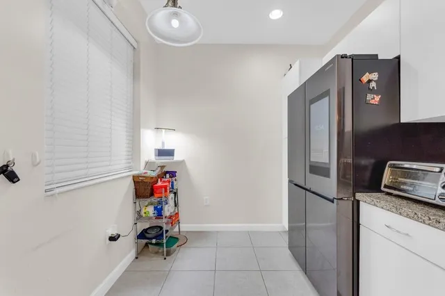a view of bedroom with furniture and wooden floor
