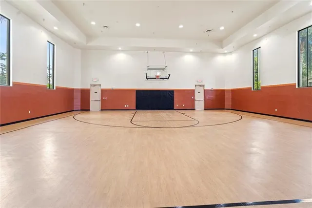 a backyard of a house with fountain and barbeque oven
