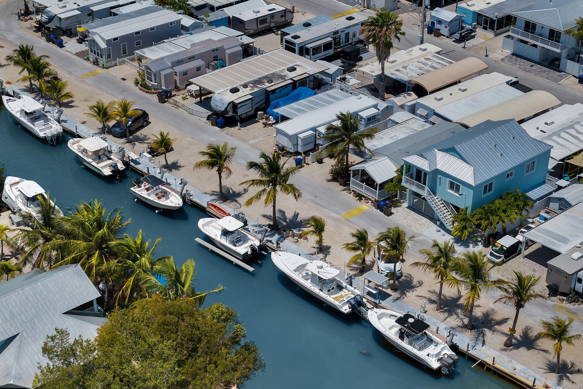 325 Calusa Street, Unit 250 Key Largo, FL 33037 - Photo 28 of 63 an aerial view of a house with a yard and lake view