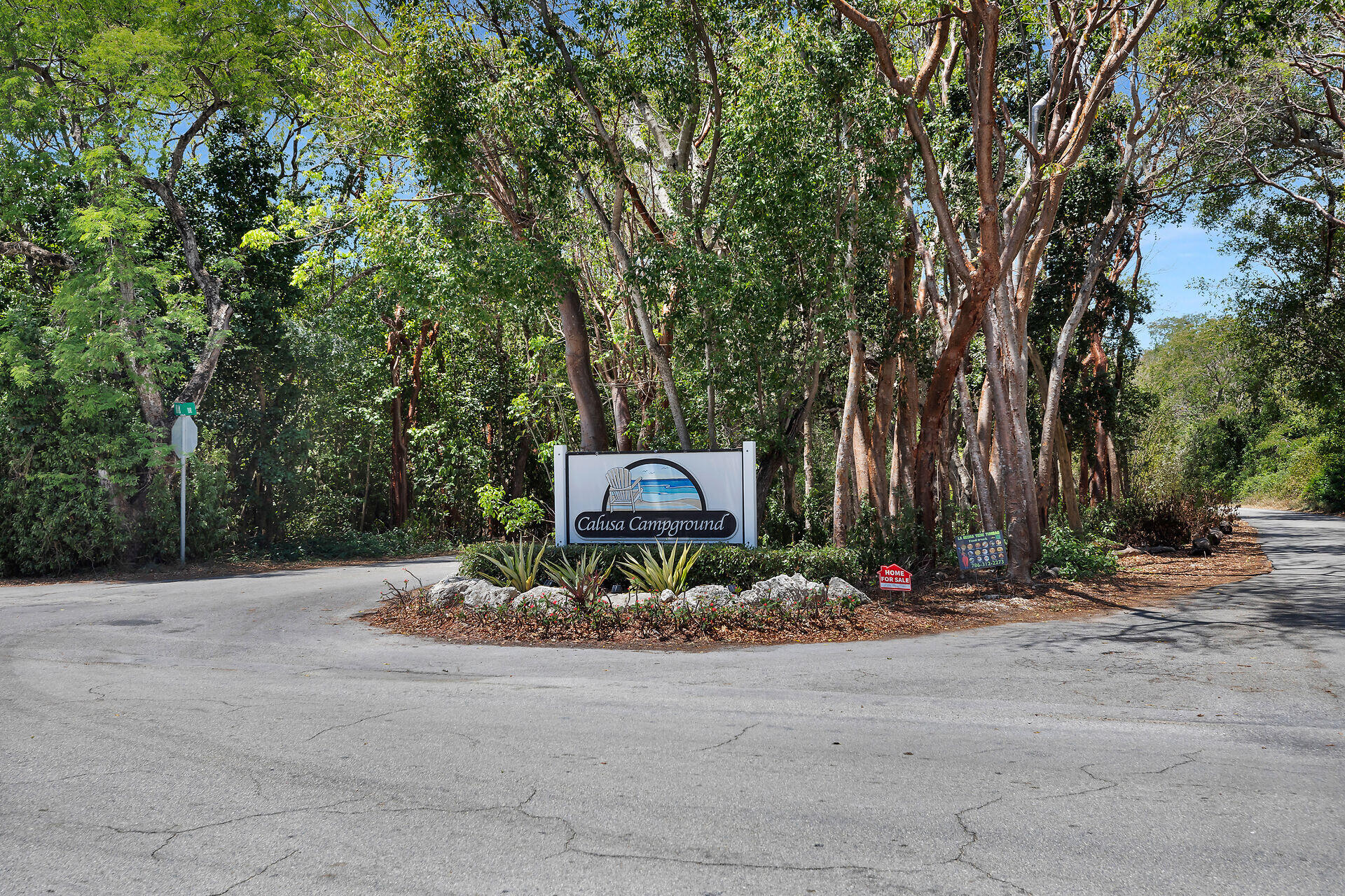 325 Calusa Street, Unit 250 Key Largo, FL 33037 - Photo 35 of 63 a car parked on the side of the road