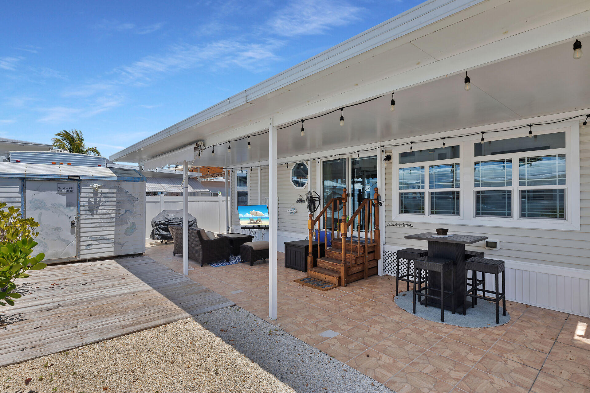 325 Calusa Street, Unit 250 Key Largo, FL 33037 - Photo 38 of 63 a view of a patio with table and chairs
