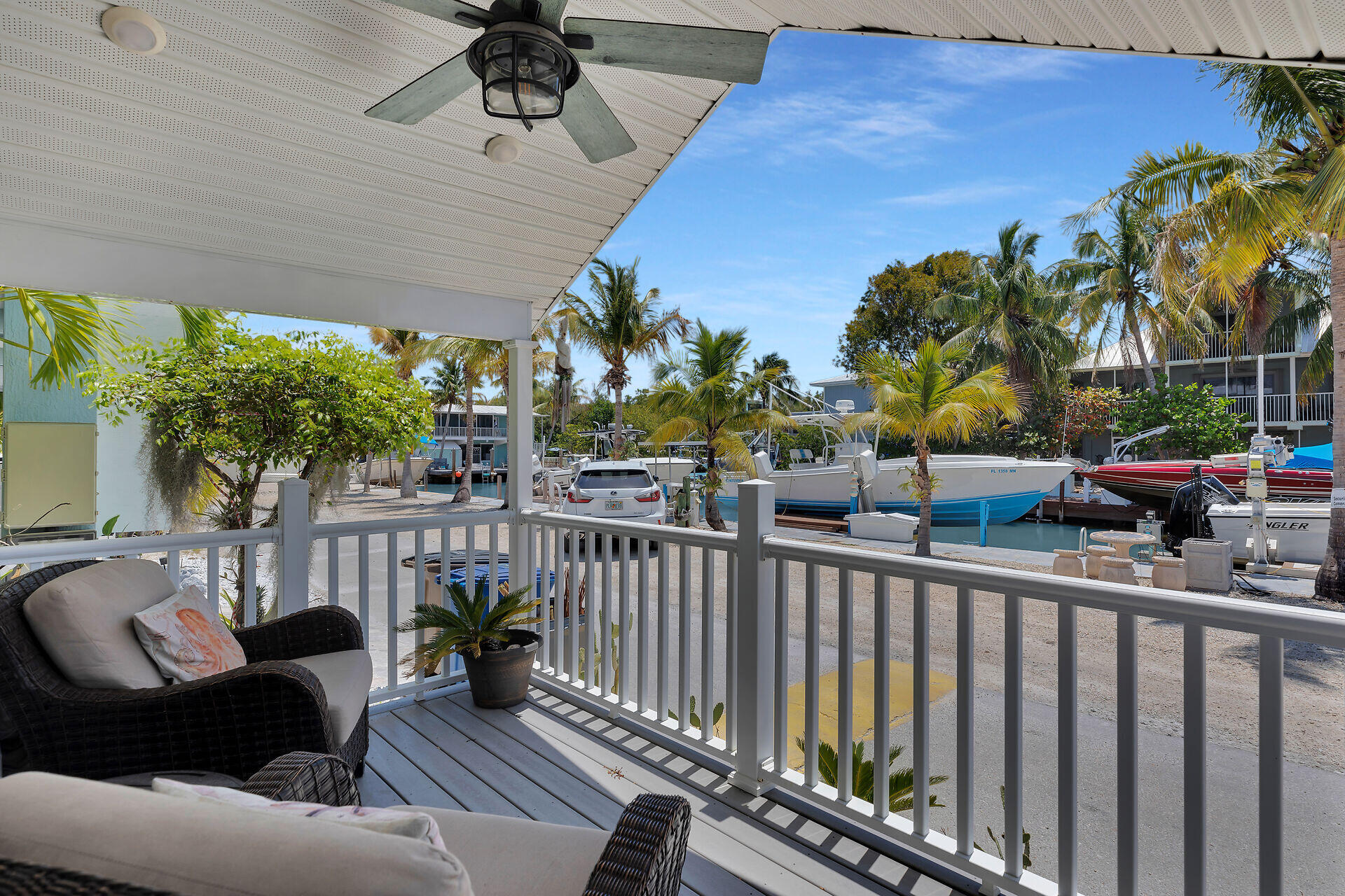 325 Calusa Street, Unit 250 Key Largo, FL 33037 - Photo 42 of 63 a view of a balcony with furniture