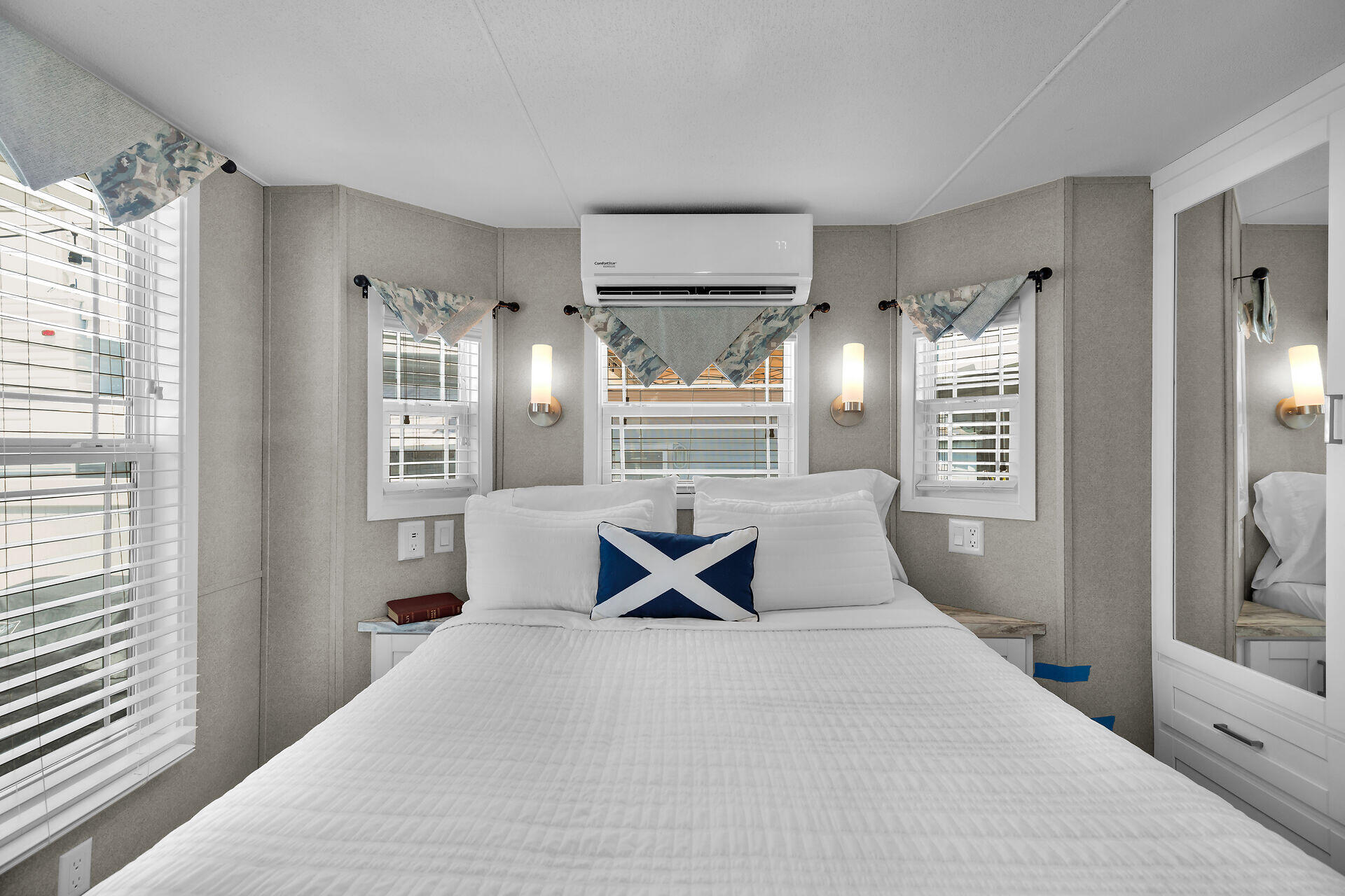 325 Calusa Street, Unit 250 Key Largo, FL 33037 - Photo 54 of 63 a bedroom with a large bed and a window