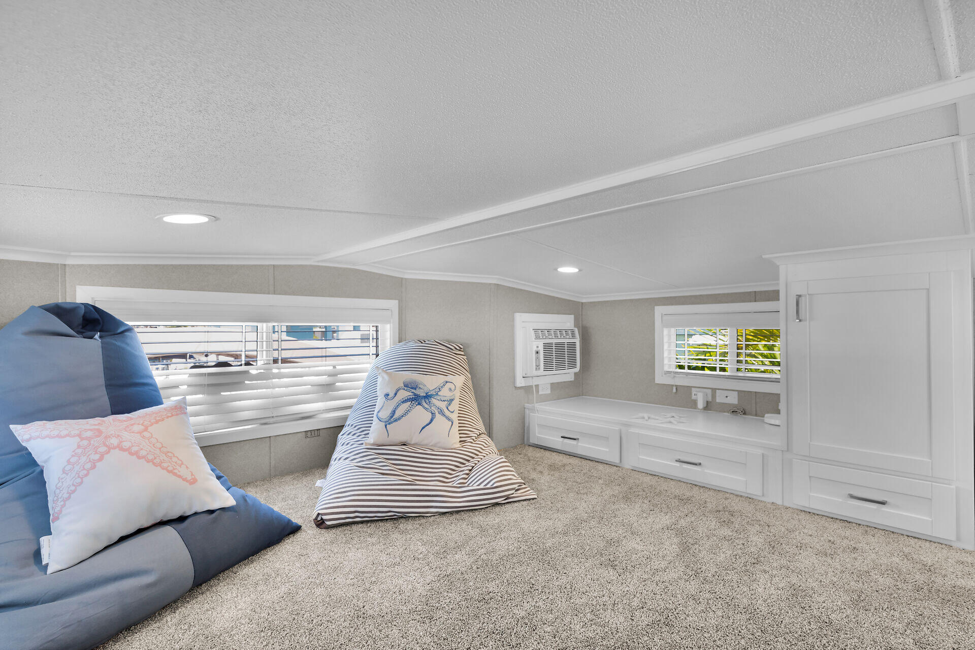 325 Calusa Street, Unit 250 Key Largo, FL 33037 - Photo 59 of 63 a living room with furniture and a flat screen tv