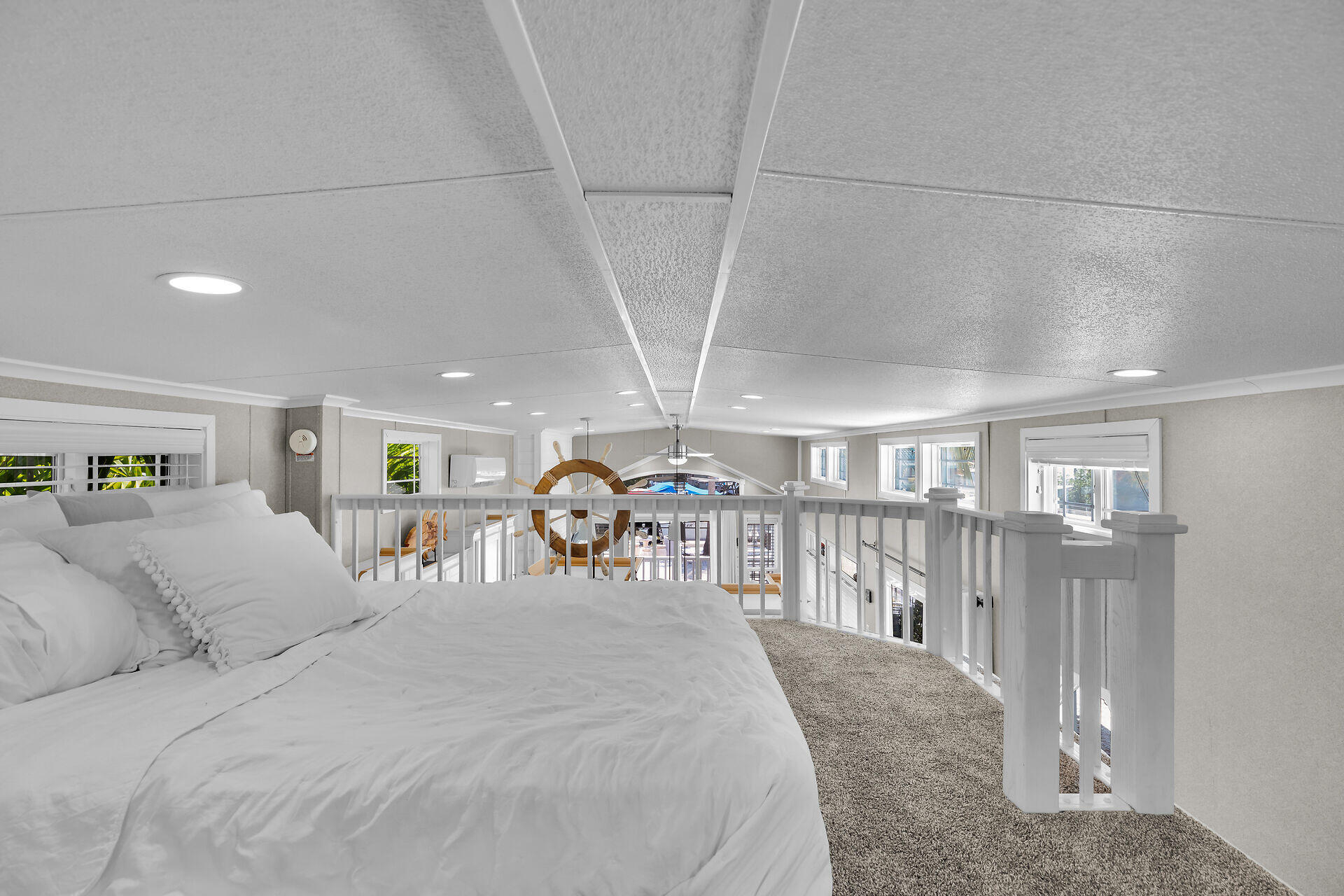 325 Calusa Street, Unit 250 Key Largo, FL 33037 - Photo 61 of 63 a bed room with a bed and a large window