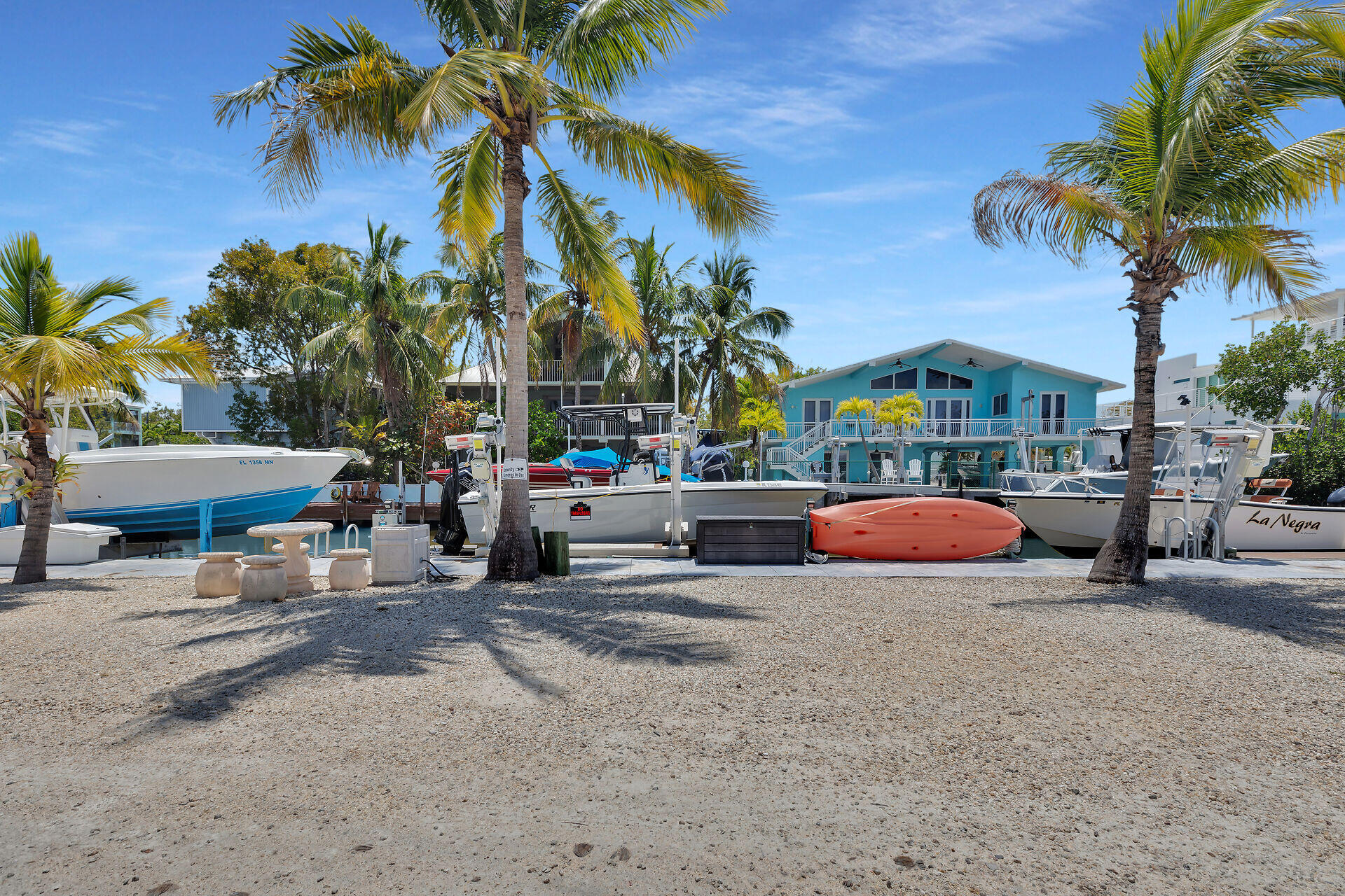 325 Calusa Street, Unit 250 Key Largo, FL 33037 - Photo 62 of 63 a view of outdoor space with swimming pool and lounge chair