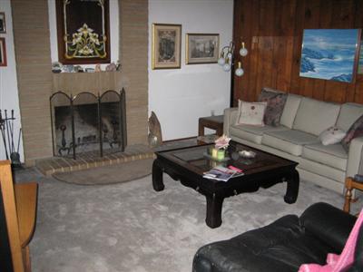 2329 Floral Way Santa Rosa, CA 95403 - Photo 3 of 8 a living room with furniture and a coffee table