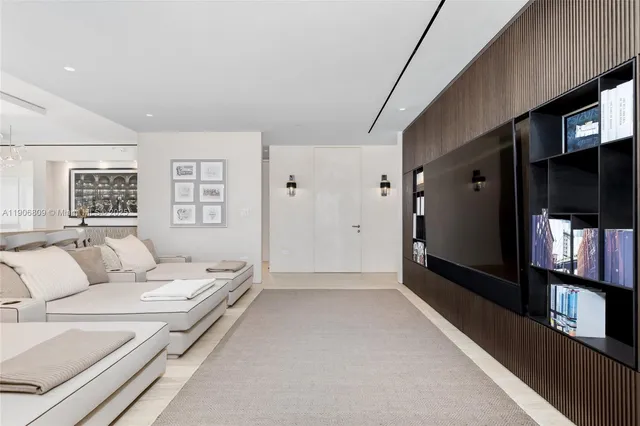 a bathroom with a tub sink and a window