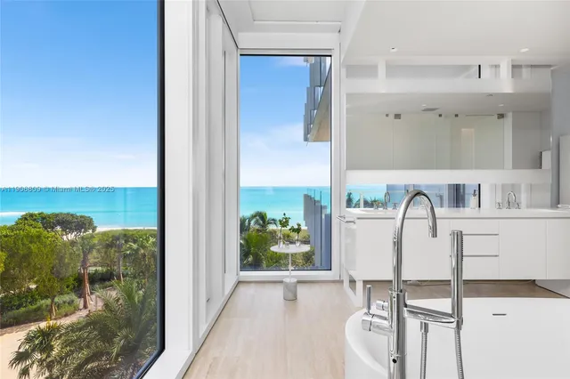 a bedroom with bed and cupboard