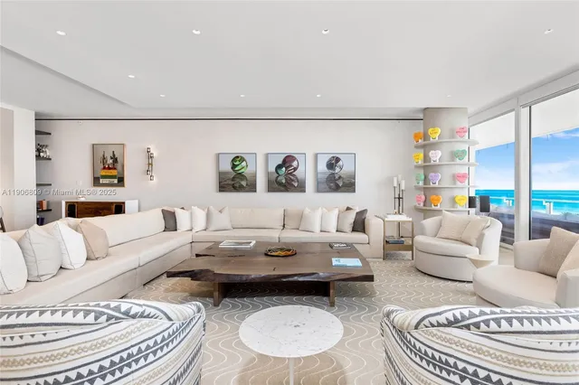 a living room with furniture and a table