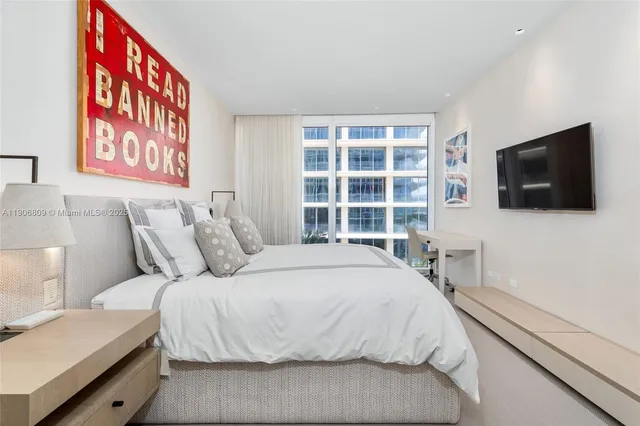 a view of kitchen with cabinets and washer dryer
