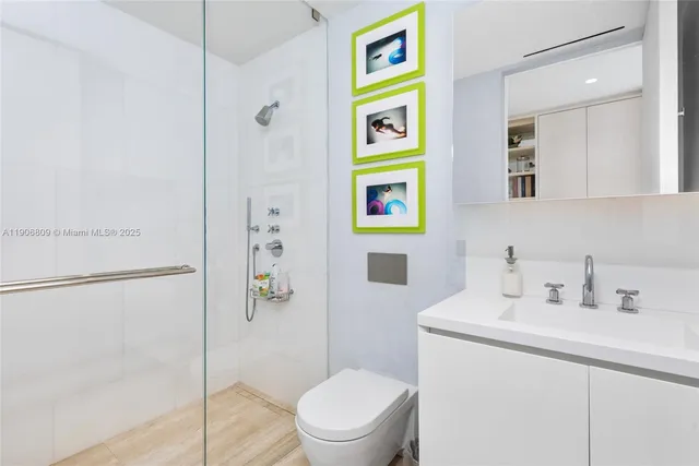 a view of roof deck with couches and wooden floor