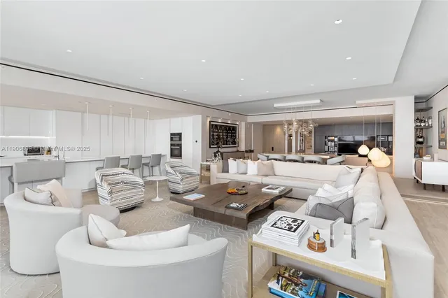 a large kitchen with lots of counter space and windows