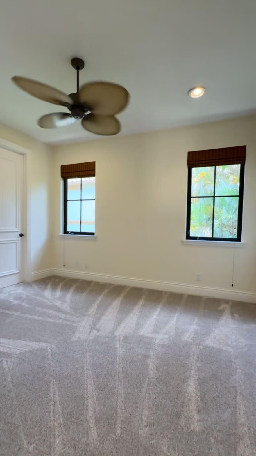 9407 Bridgebrook Drive Boca Raton, FL 33496 - Photo 16 of 32 a view of an empty room with a window