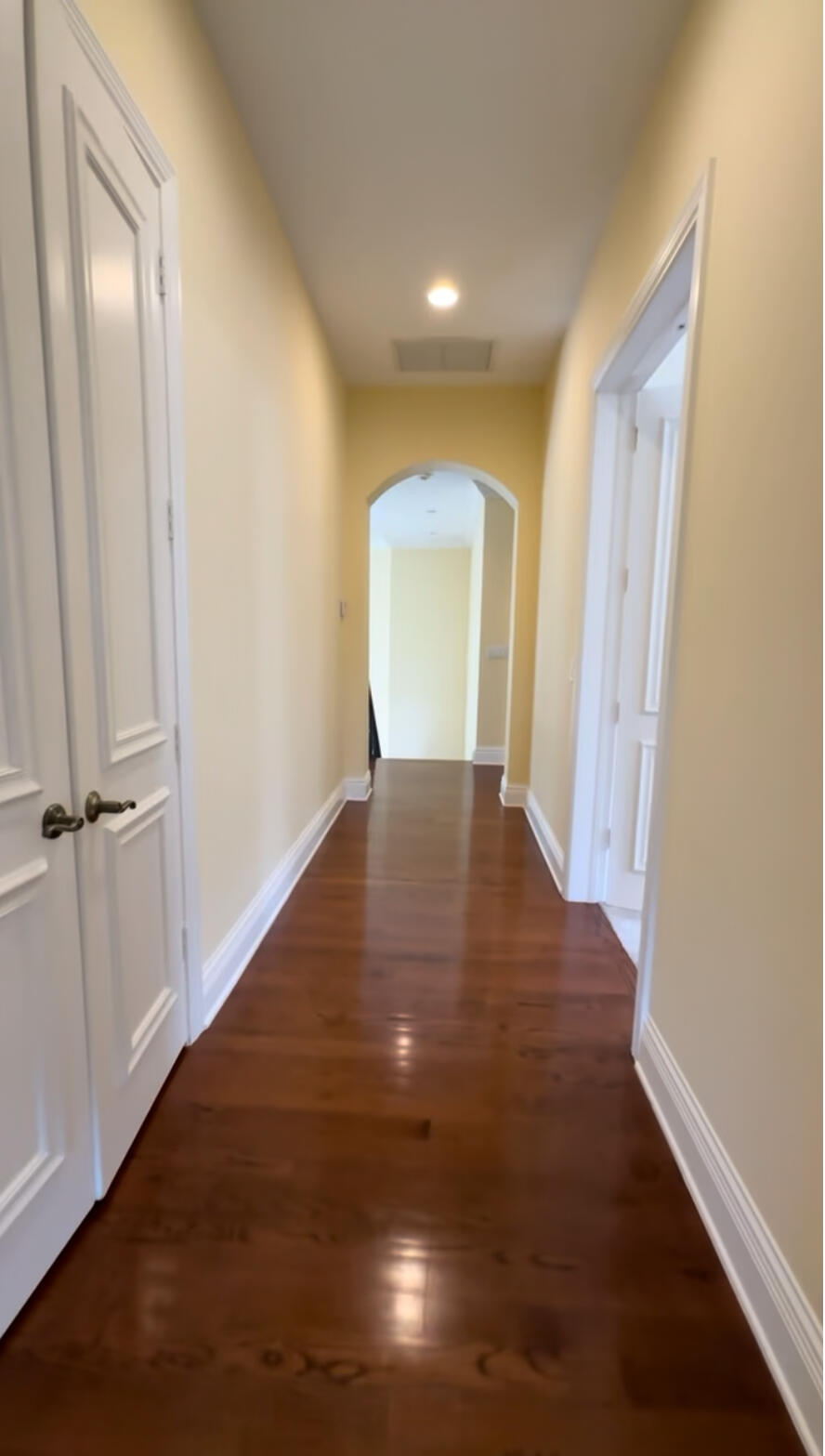 9407 Bridgebrook Drive Boca Raton, FL 33496 - Photo 18 of 32 a view of a hallway with wooden floor