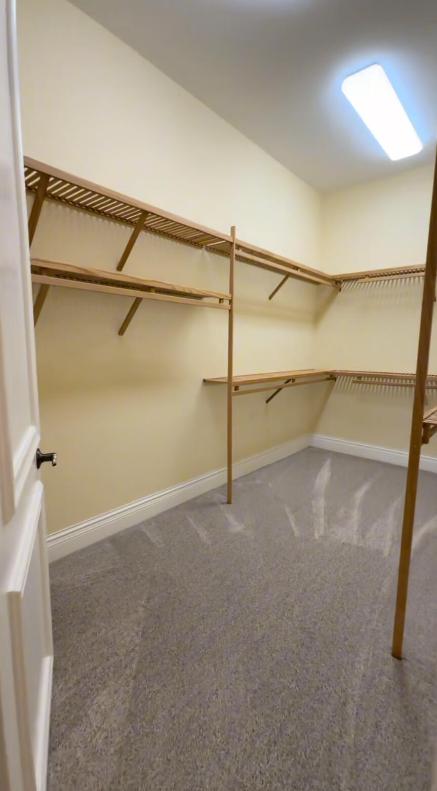 9407 Bridgebrook Drive Boca Raton, FL 33496 - Photo 28 of 32 a view of a room with racks on the wall