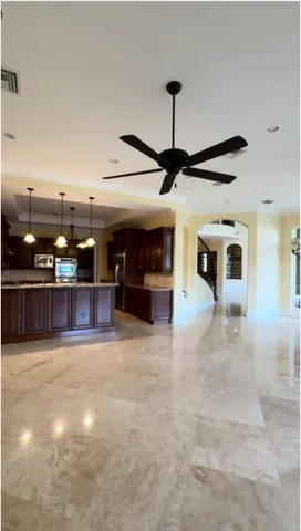 a view of a hall with a tv