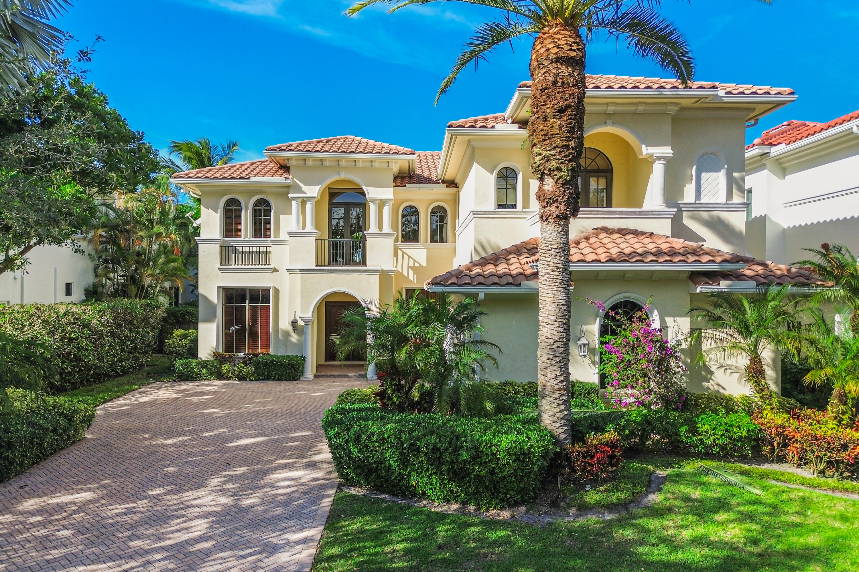 9407 Bridgebrook Drive Boca Raton, FL 33496 - Photo 86 of 89 a view of a white apartments with large windows