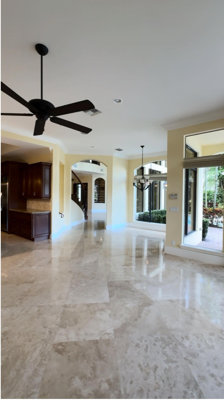 9407 Bridgebrook Drive Boca Raton, FL 33496 - Photo 9 of 32 a view of a hall with a tv