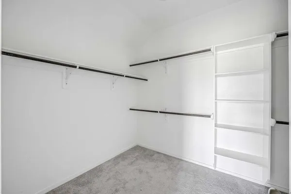 a view of an empty walk in closet