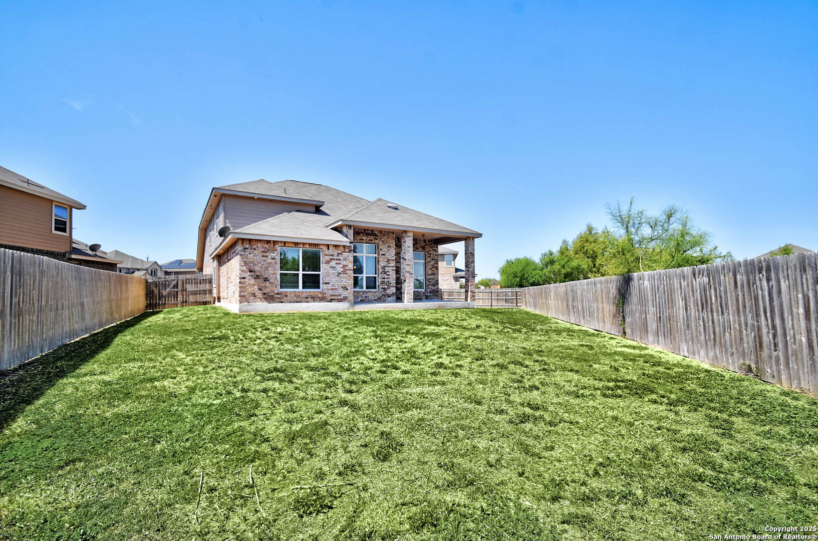 7327 Lunar Eclipse Converse, TX 78109 - Photo 23 of 24 a front view of a house with garden