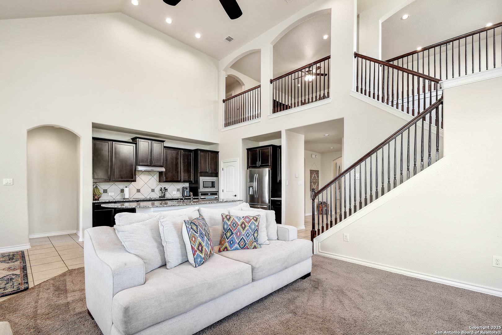 7327 Lunar Eclipse Converse, TX 78109 - Photo 7 of 24 a living room with furniture fireplace and a flat screen tv