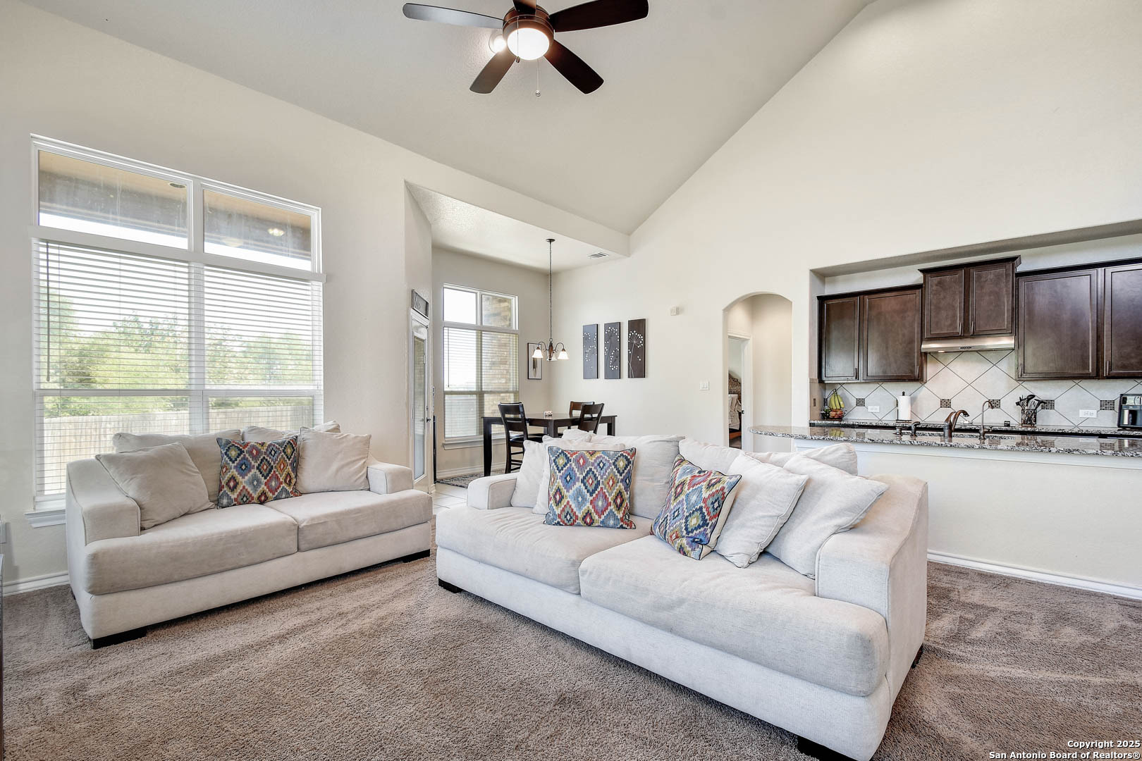 7327 Lunar Eclipse Converse, TX 78109 - Photo 9 of 24 a living room with furniture and a large window
