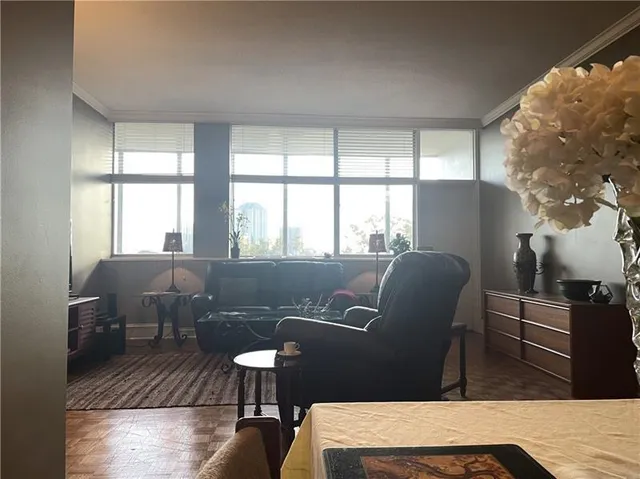 a living room with furniture and a window