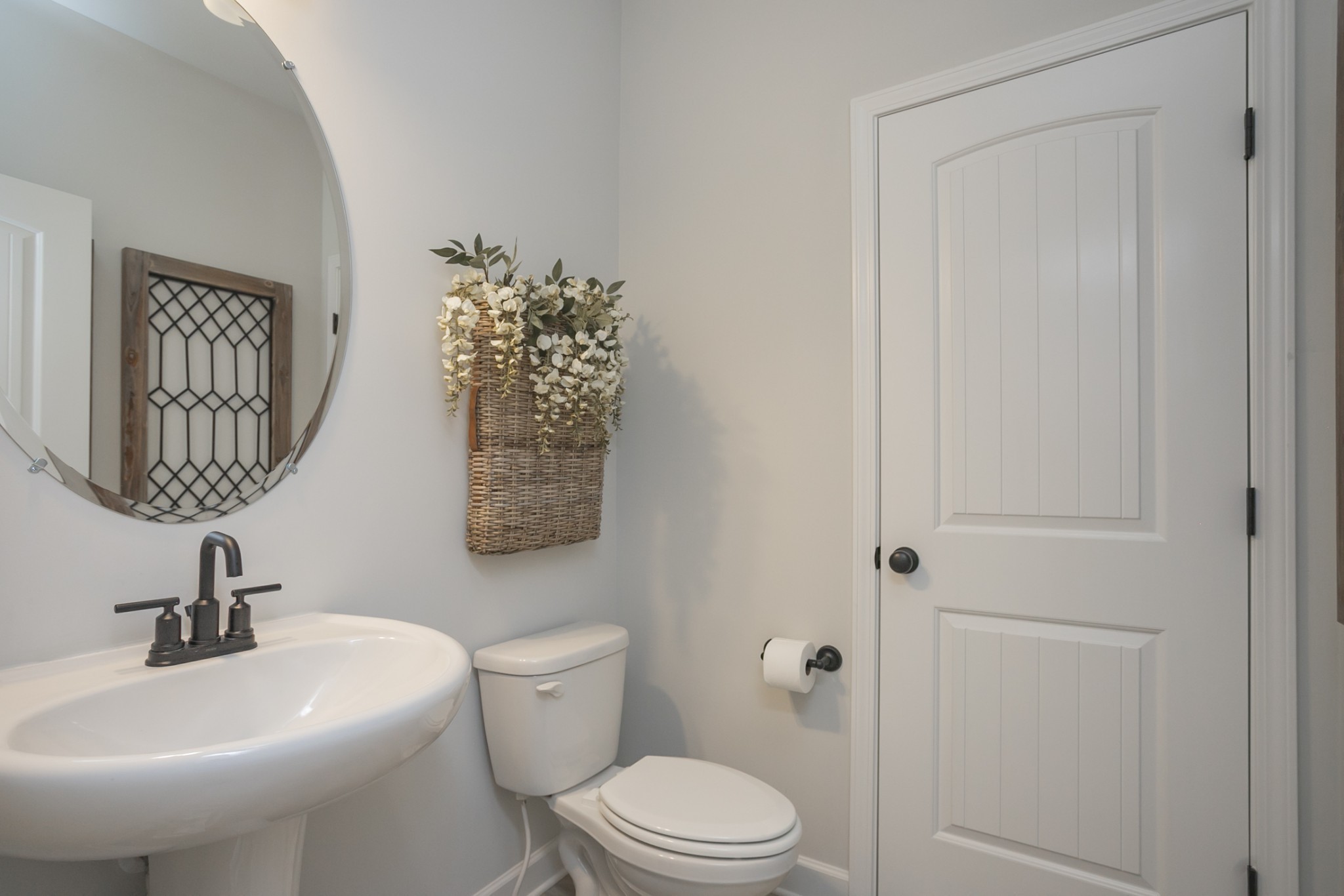321 Ellis Lane Lebanon, TN 37087 - Photo 12 of 30 a bathroom with a toilet a sink and mirror