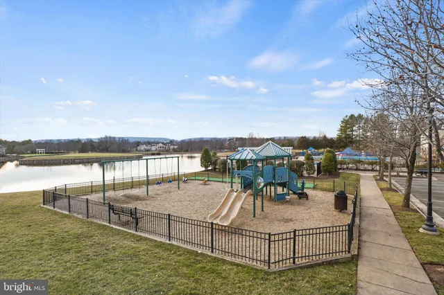 a view of a swimming pool and lake view