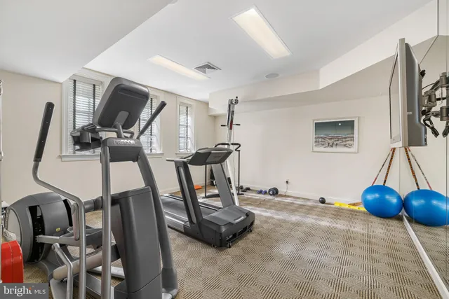 a view of a room with gym equipment