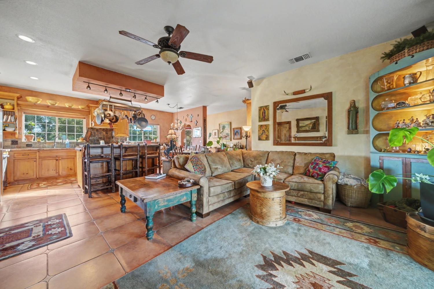 15900 Highway 88 Jackson, CA 95642 - Photo 13 of 48 a living room with lots of furniture and a chandelier