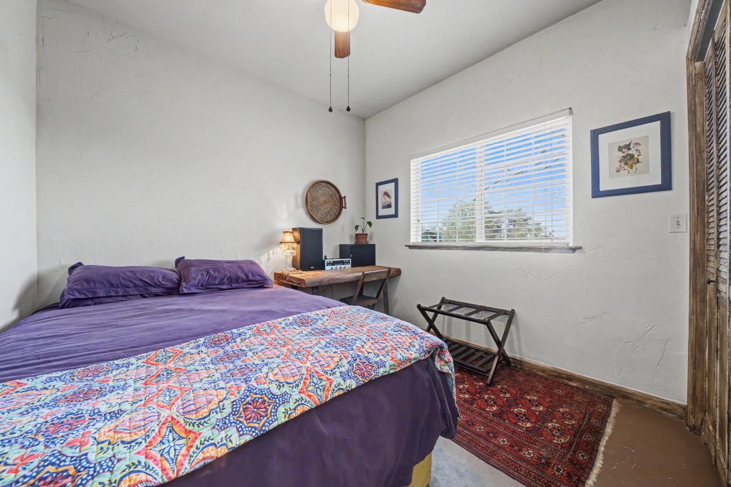 15900 Highway 88 Jackson, CA 95642 - Photo 22 of 48 a bedroom with a large bed and a window