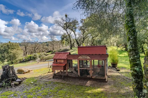 a view of a swimming pool with sitting area