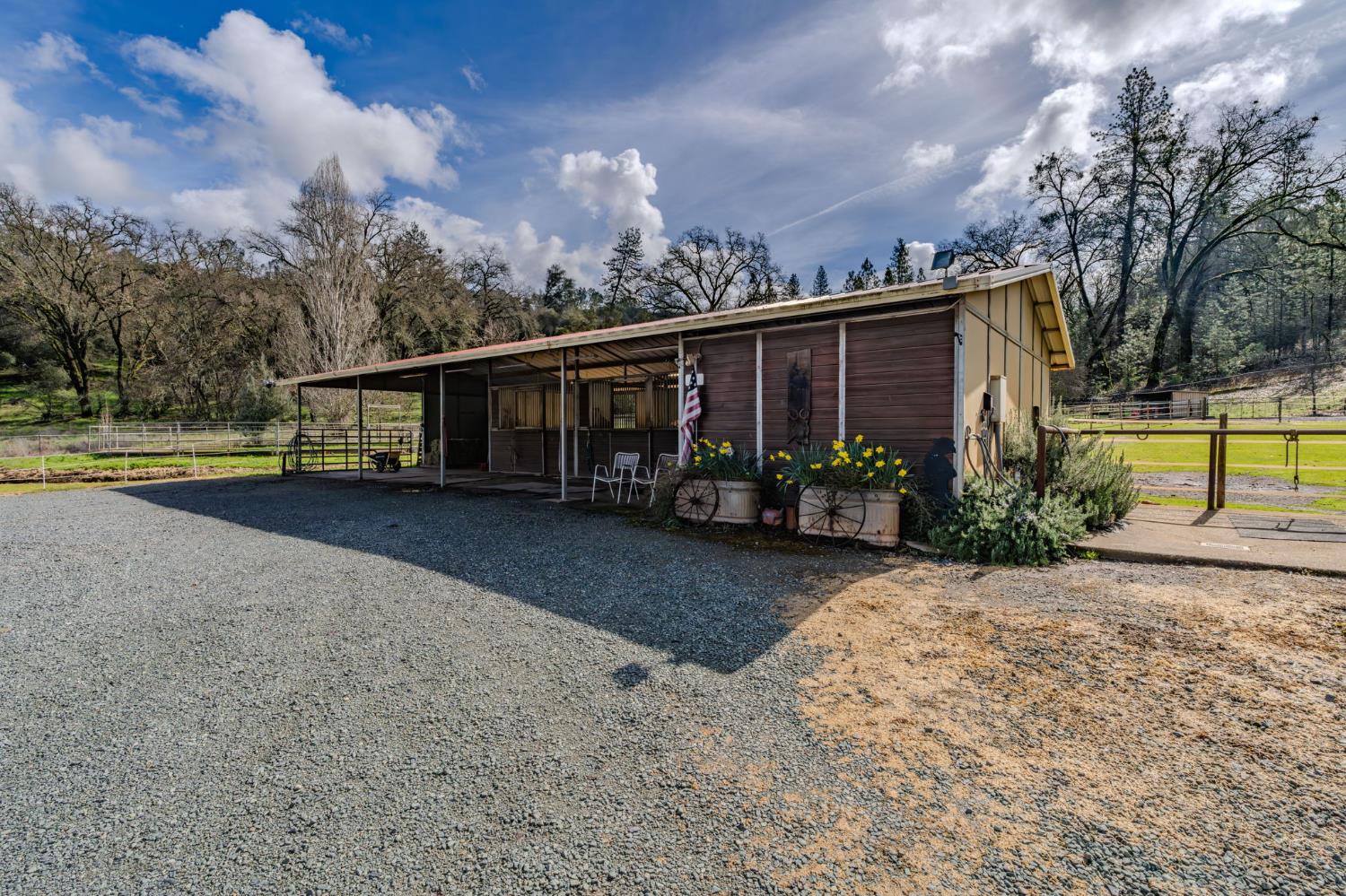 15900 Highway 88 Jackson, CA 95642 - Photo 37 of 48 a view of a house with garden and pathway