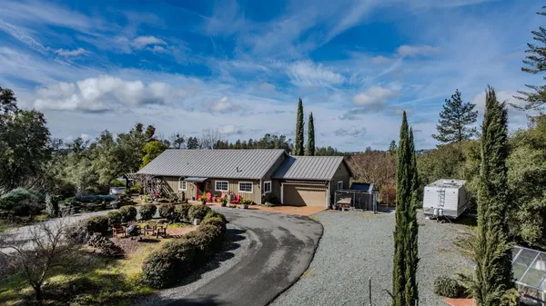 an outdoor space with furniture and stove