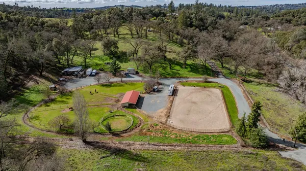an aerial view of a house with outdoor space pool seating area and entertaining space