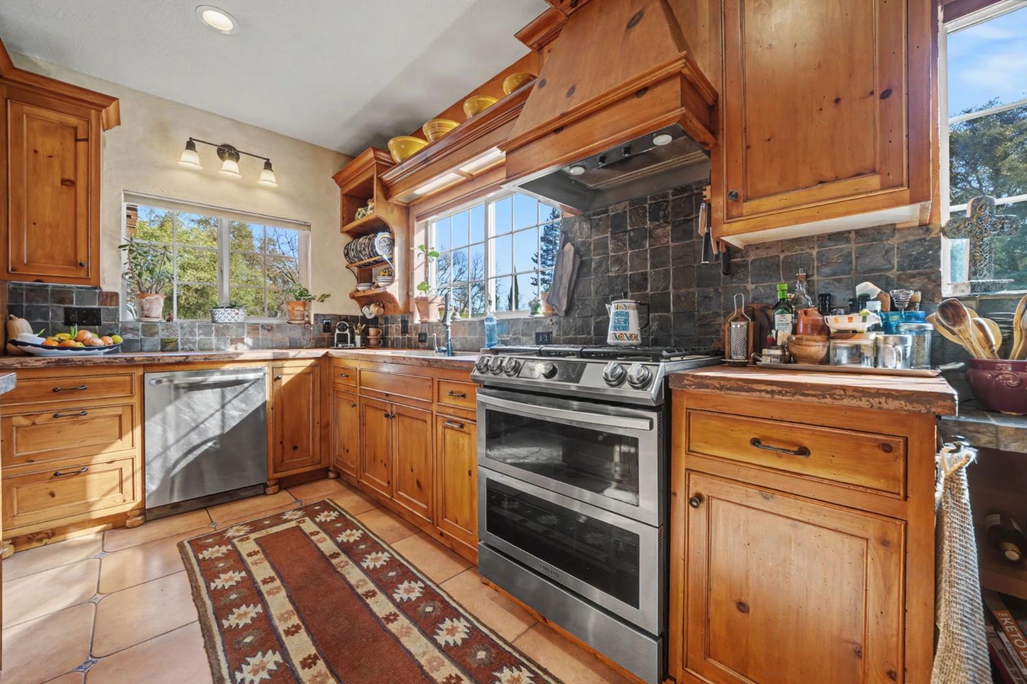 15900 Highway 88 Jackson, CA 95642 - Photo 6 of 48 a kitchen with a stove oven and sink