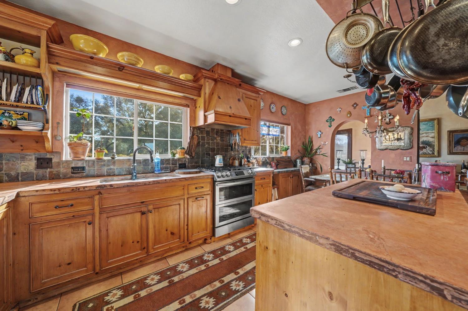 15900 Highway 88 Jackson, CA 95642 - Photo 8 of 48 a kitchen with furniture a stove and a sink